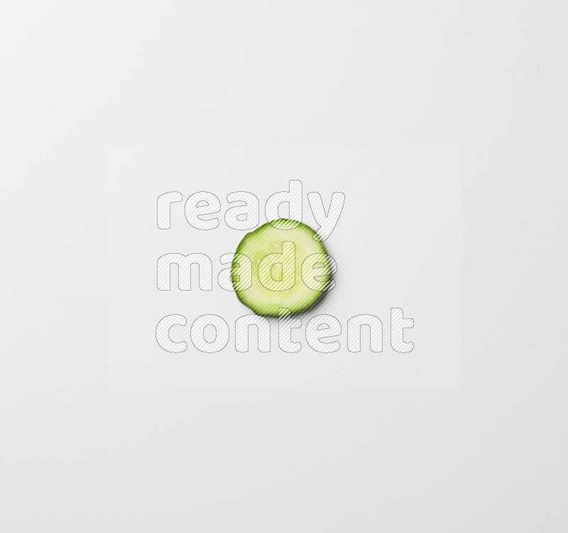 A cucumber slice on white background