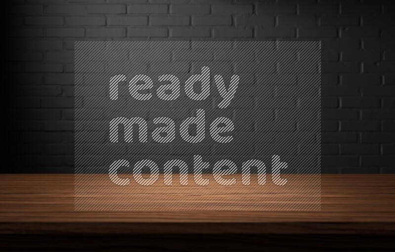 A wooden table top with colored brick wall background