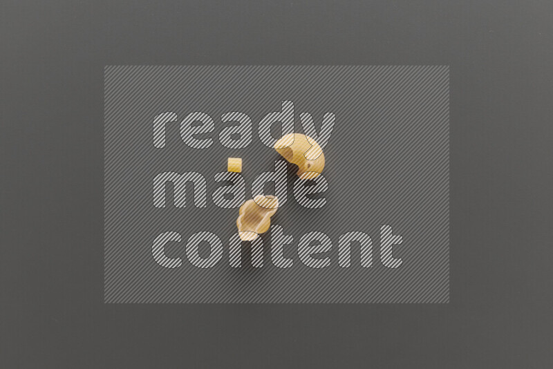Different pasta types on grey background
