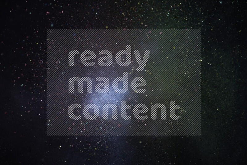 Colorful powder explosion on black background