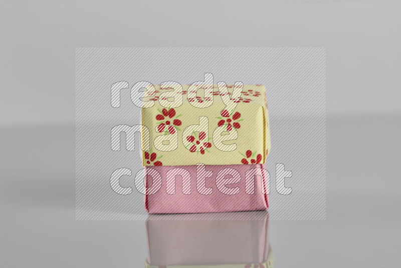 Origami gift box on grey background