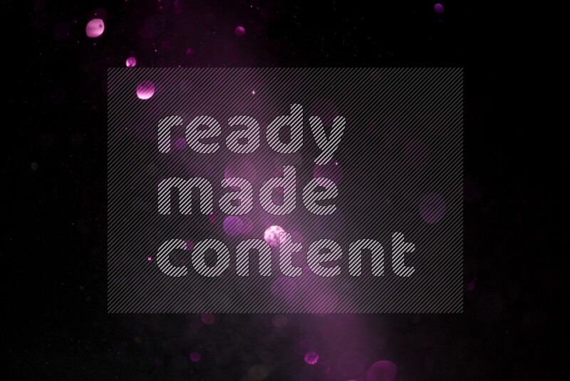 Pink glitter powder isolated on black background