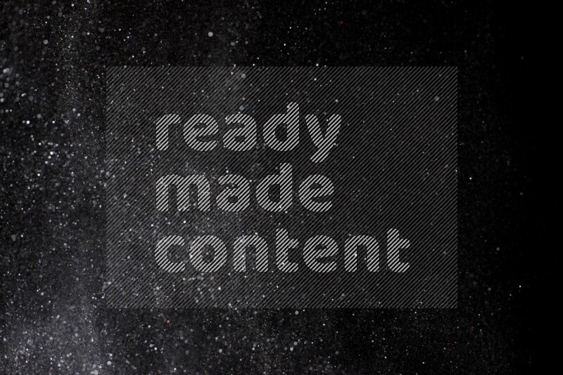 Silver glitter powder isolated on black background