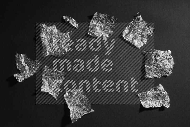 Aluminium foil on black background