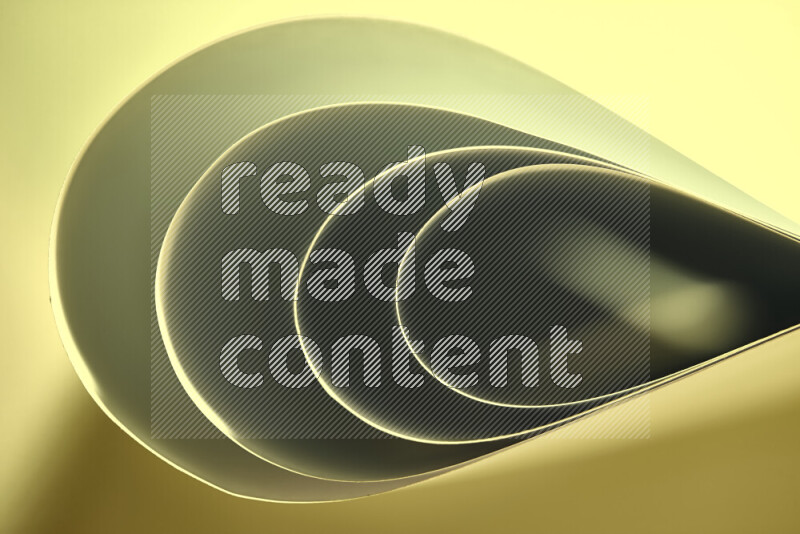 An abstract art of paper folded into smooth curves in green gradients