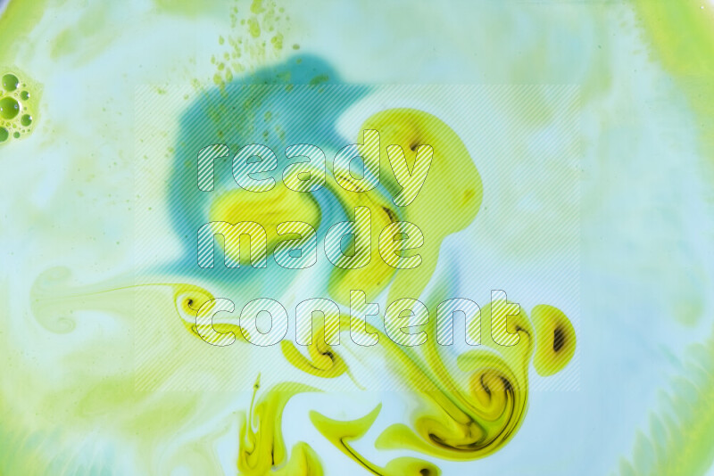 A close-up of abstract swirling patterns in green gradients