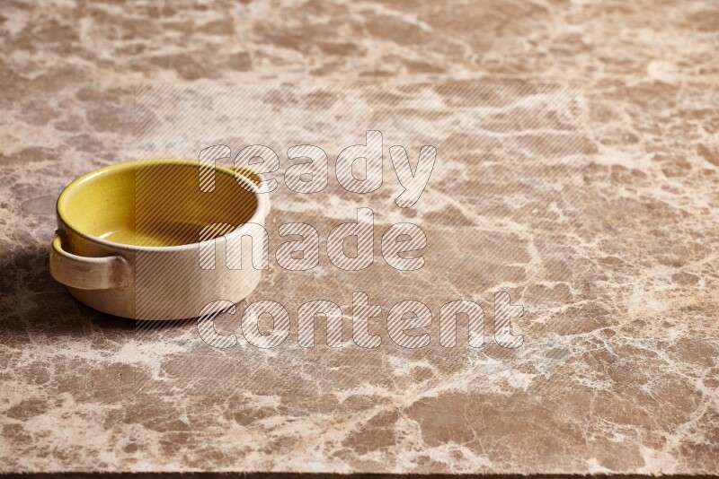 Multicolored Pottery Bowl on Beige Marble Flooring