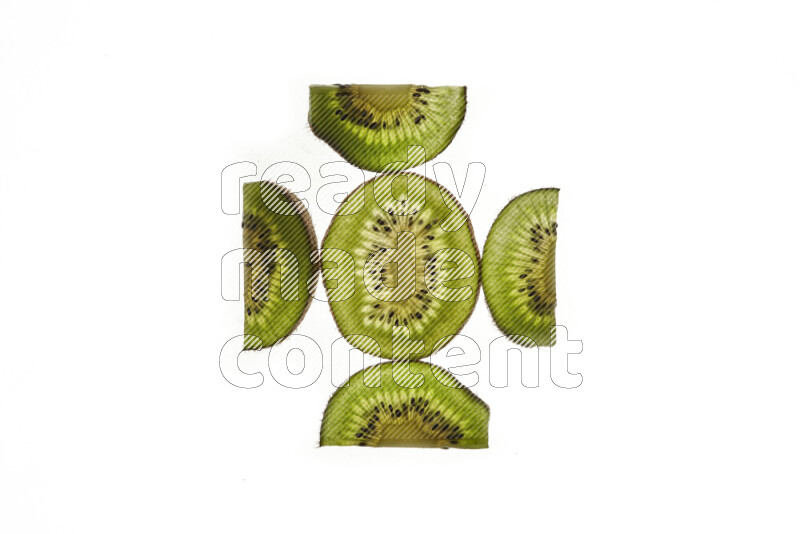 Kiwi slices on illuminated white background