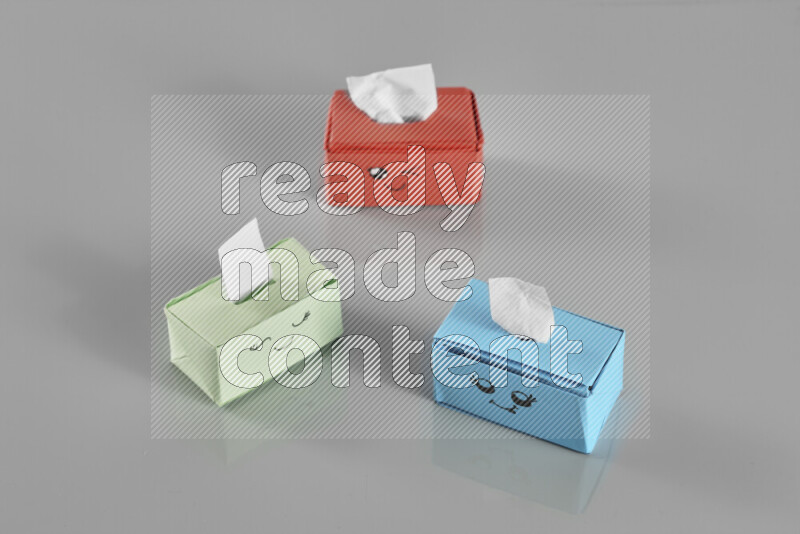 Origami tissue box on grey background