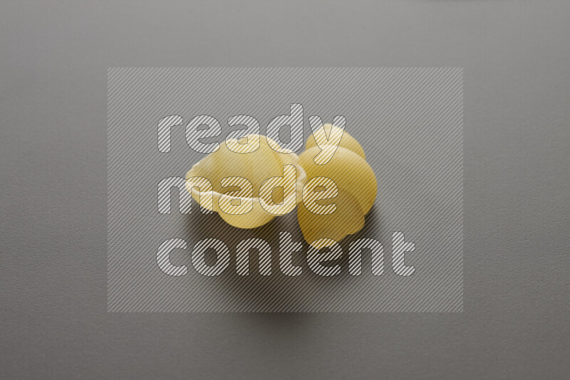 Snails pasta on grey background