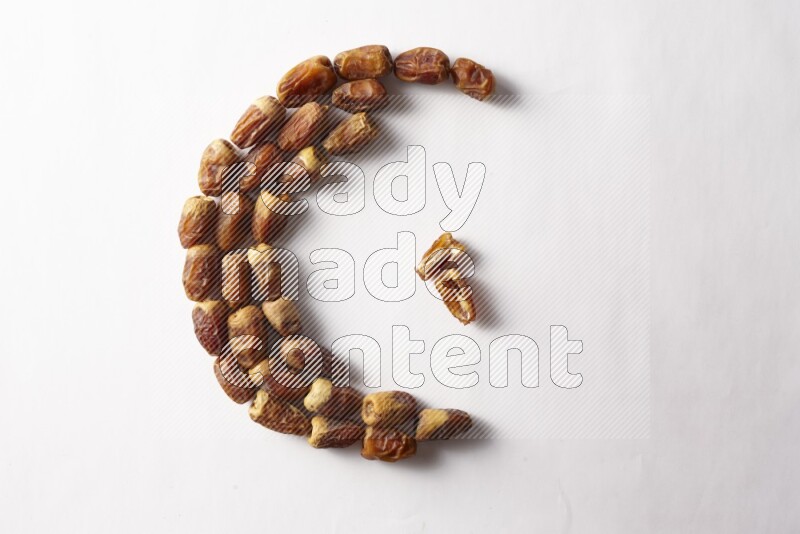 Dates in a crescent shape on white background