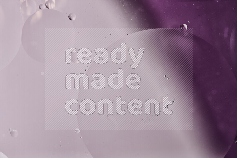 Close-ups of abstract oil bubbles on water surface in shades of white and purple
