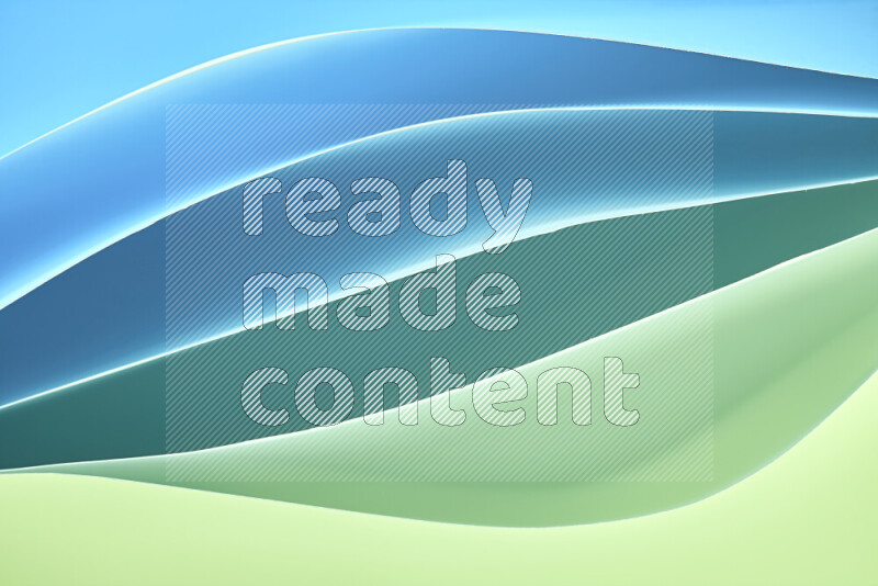 This image showcases an abstract paper art composition with paper curves in green and blue gradients created by colored light