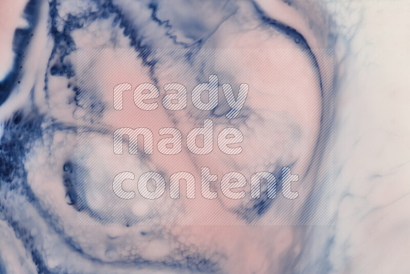 A close-up of abstract swirling patterns in blue, red and white