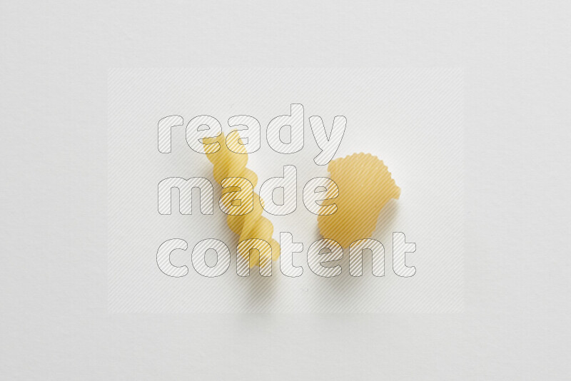 Different pasta types on white background