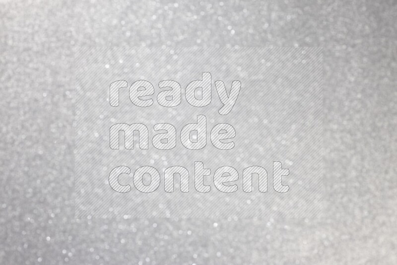 Silver glittery bokeh background