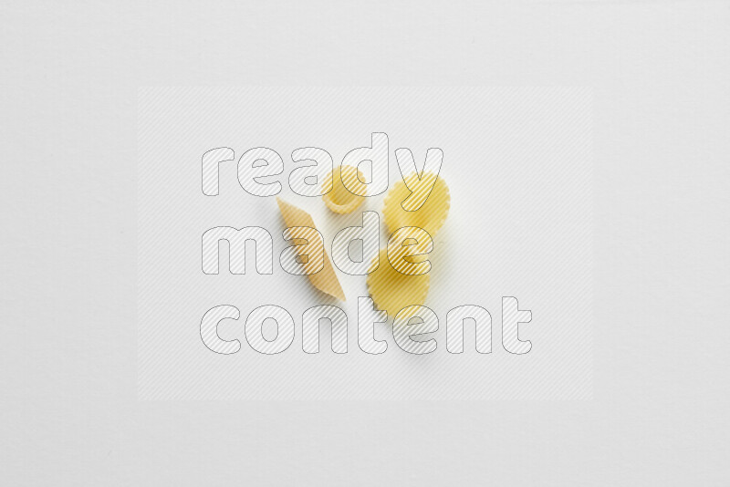 Different pasta types on white background