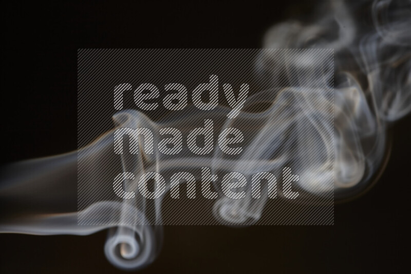 Motion of wavy smoke isolated on dark background