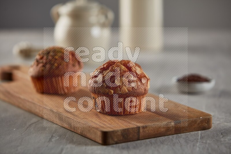Almond cupcake on a wooden board