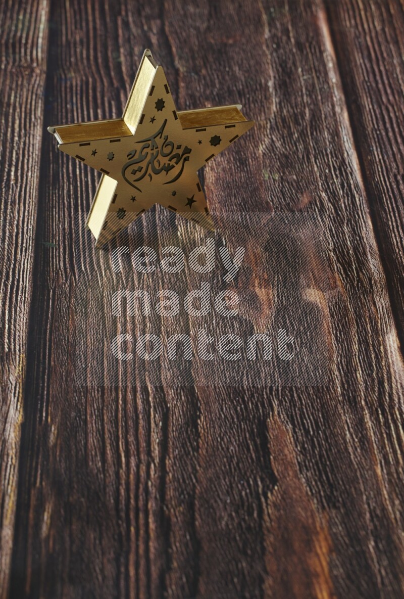 A lantern placed on a wooden background