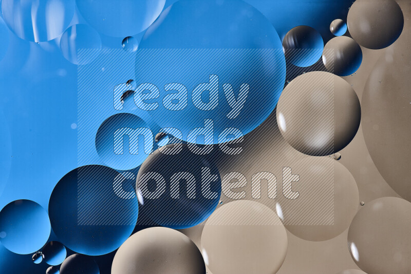 Close-ups of abstract oil bubbles on water surface in shades of blue and brown