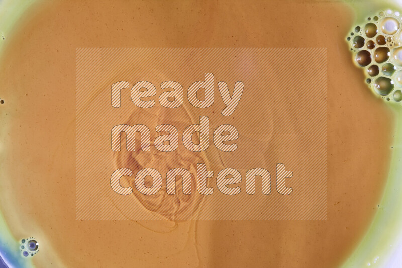 لقطة مقربة لأنماط دوامية باللون البرتقالي