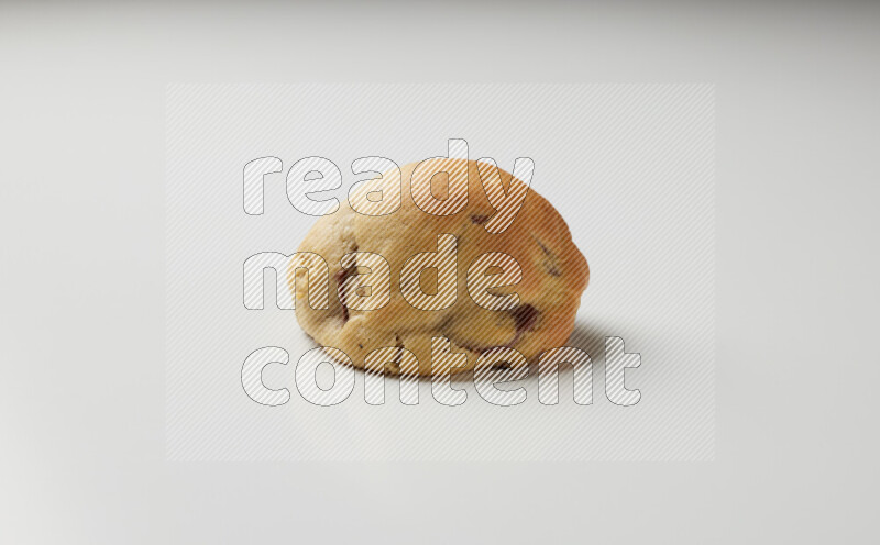 a chocolate chip cookie on a white background
