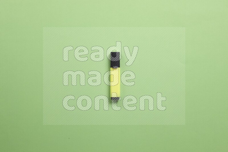Multicolored highlighter pens on green background
