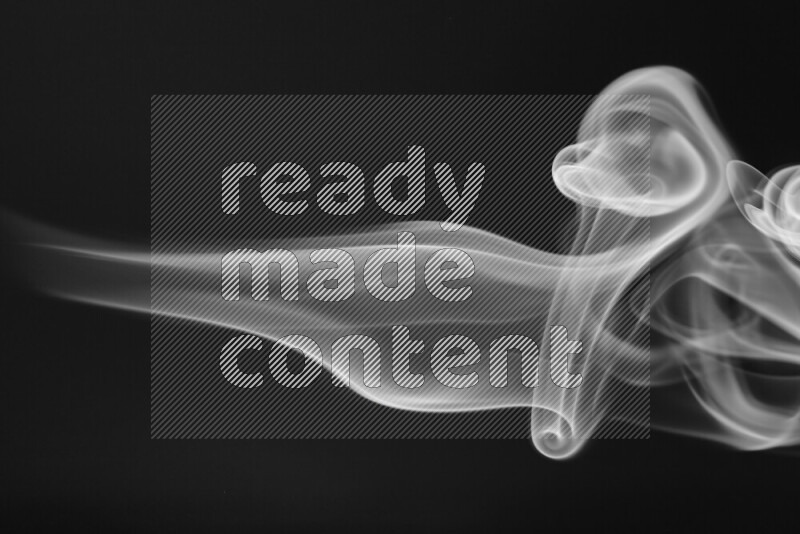 Motion of wavy smoke isolated on dark background