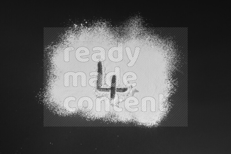 Numbers written with powder on black background