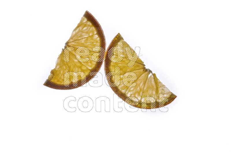 Orange slices on illuminated white background