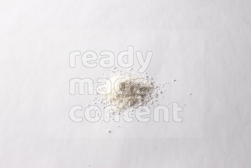 Desiccated coconuts on white background