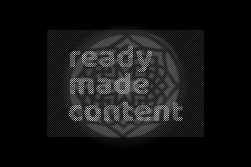 مجموعة من ضوء الغوبو الخافت تظهر أنماط هندسية علي سطح ناعم