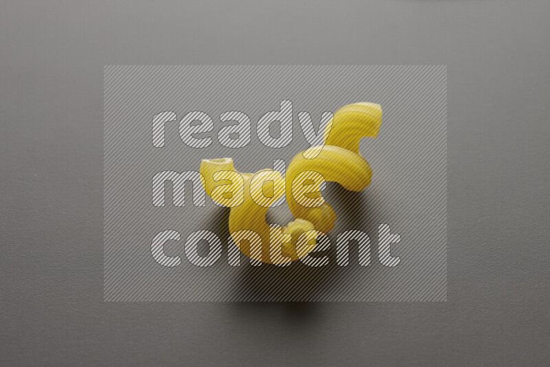 Twist pasta on grey background