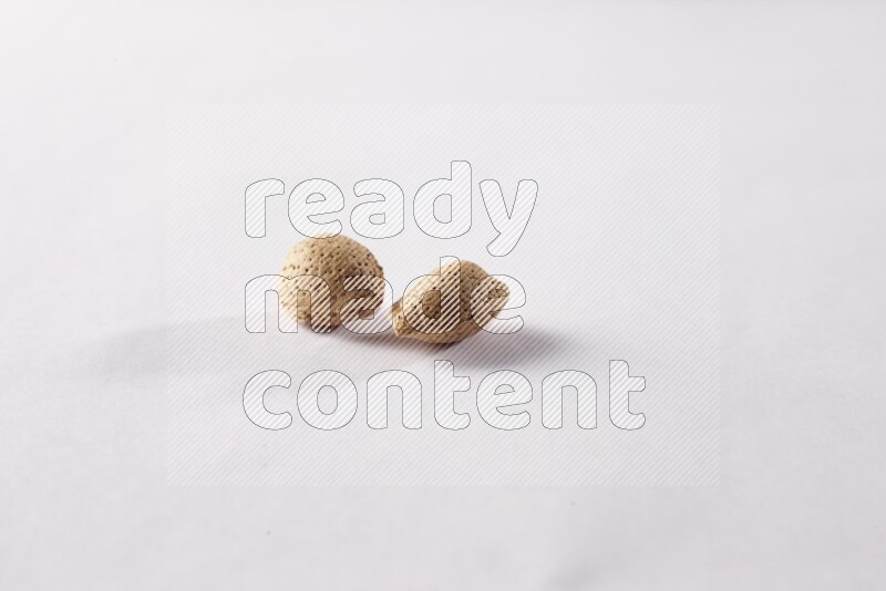 Almonds on white background