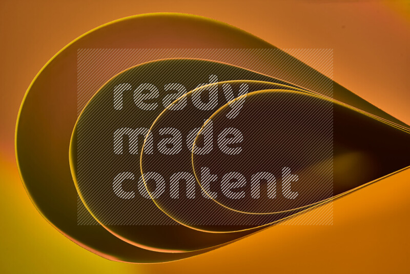 An abstract art of paper folded into smooth curves in gold gradients