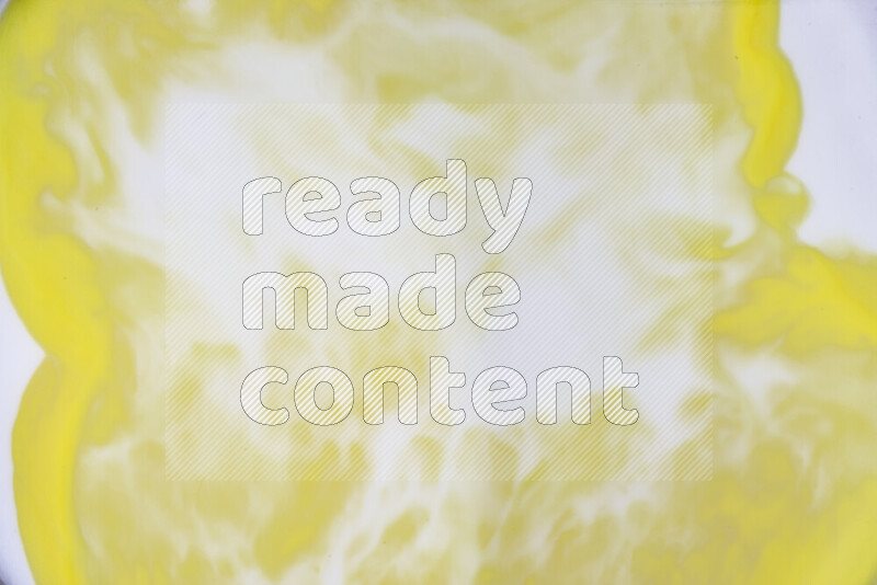 A close-up of abstract swirling patterns in yellow and white