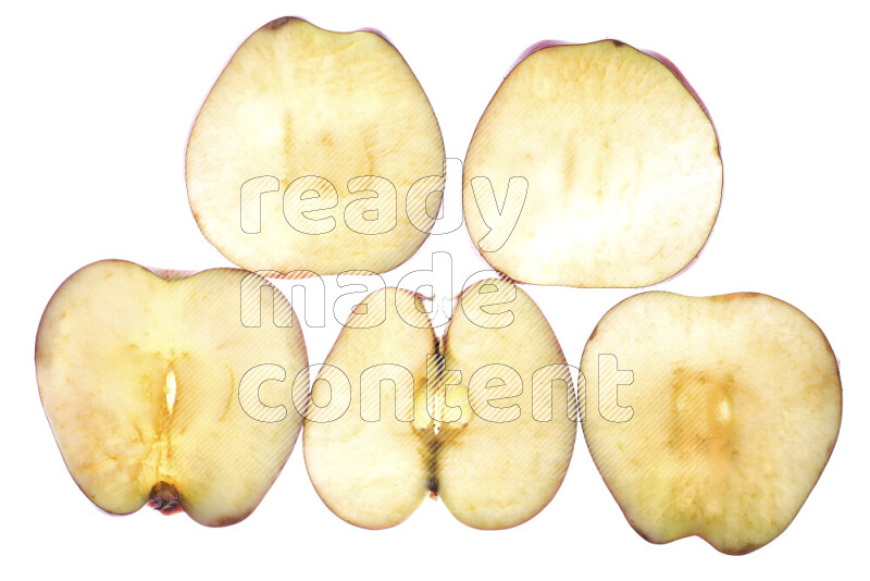Apple slices on illuminated white background
