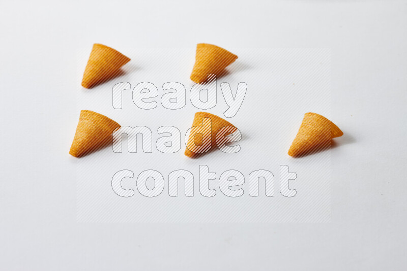Assorted snacks on white background