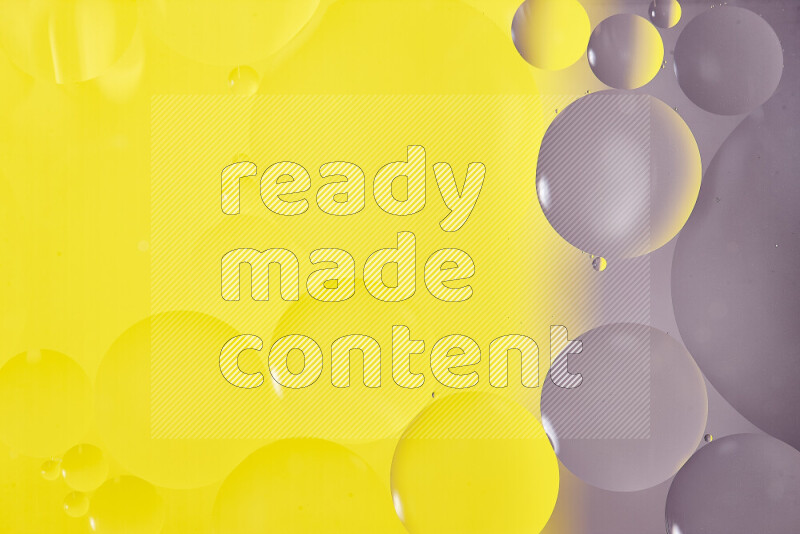 Close-ups of abstract oil bubbles on water surface in shades of white and yellow