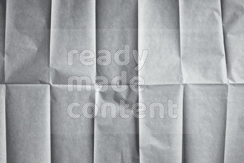 White paper sheet on black background