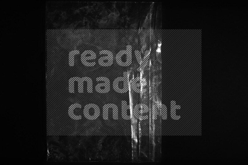 Transparent plastic textures on black background