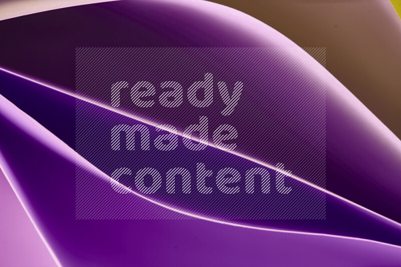 This image showcases an abstract paper art composition with paper curves in purple and gold gradients created by colored light