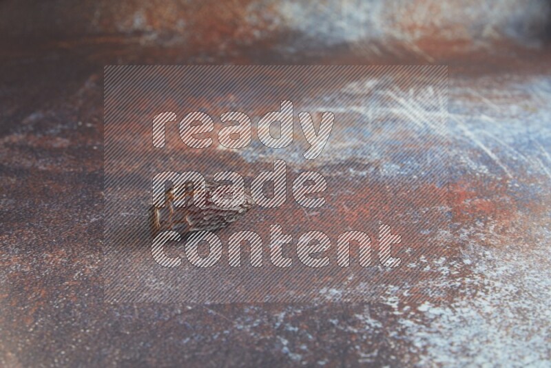 one madjoul date on a rustic reddish background