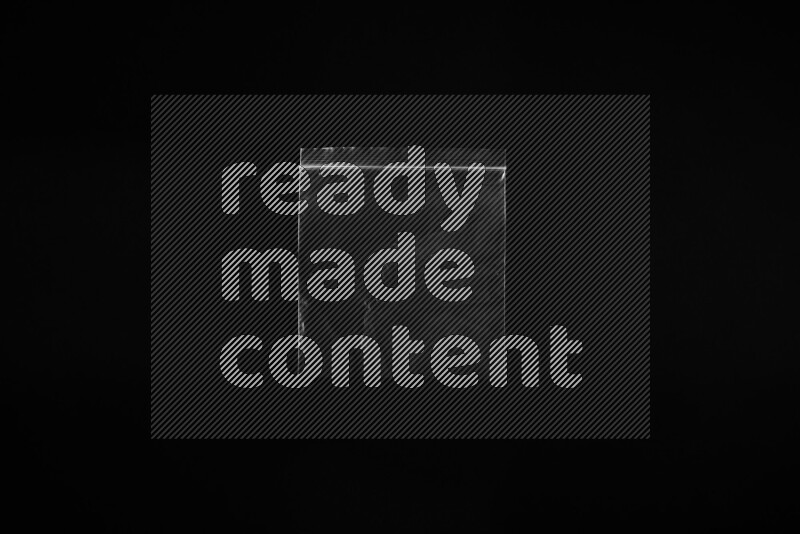 Transparent plastic textures on black background