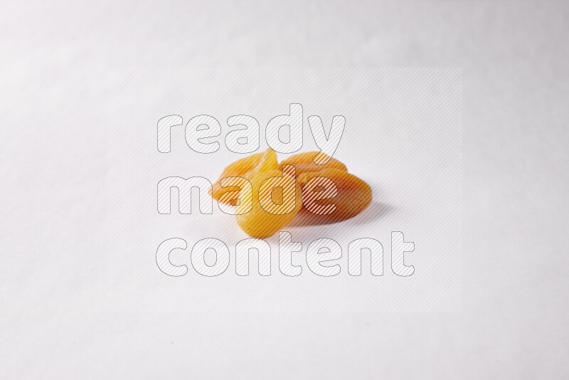 Dried apricots on white background