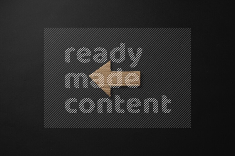 Cardboard in shapes on black background