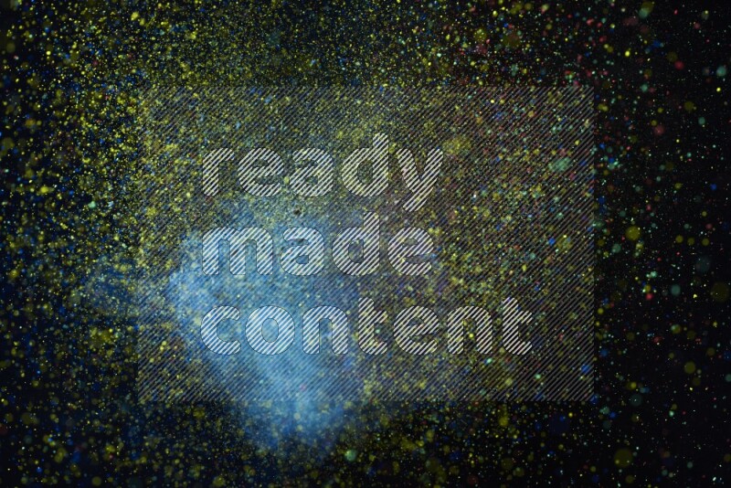 Colorful powder explosion on black background