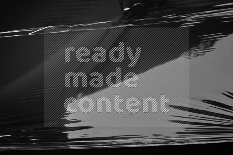 Plastic wrap texture on black background