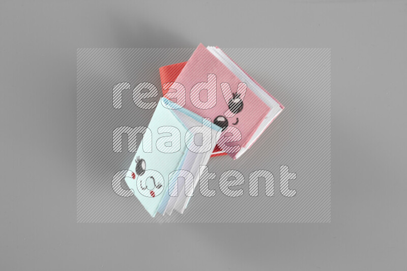 Origami book on grey background